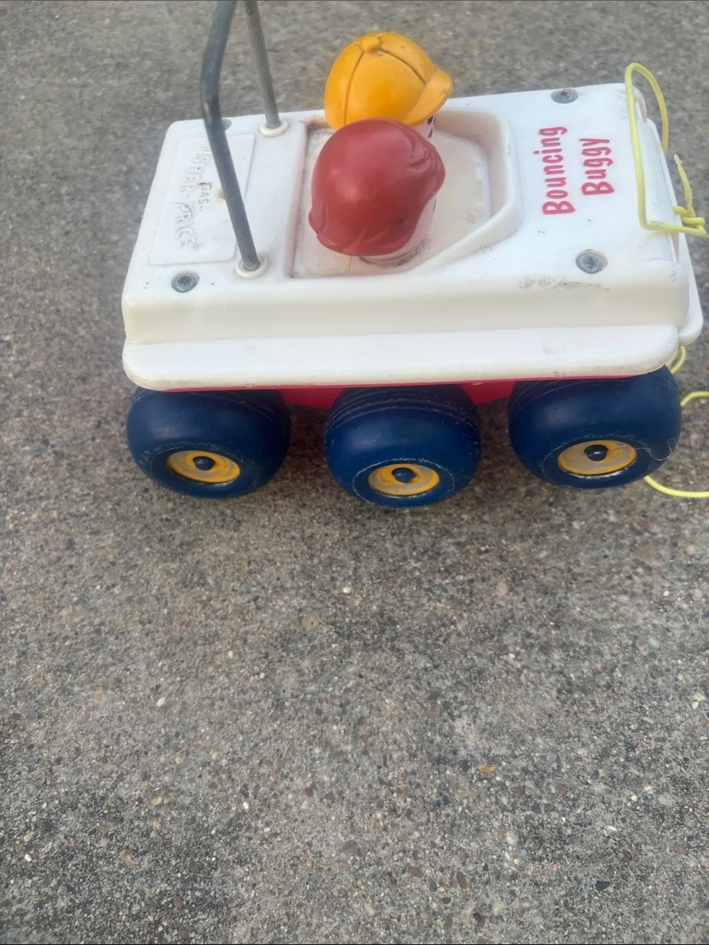 Vintage 1973 Fisher PriceBouncing Buggy Pull Toy - White with Blue & Red Accents